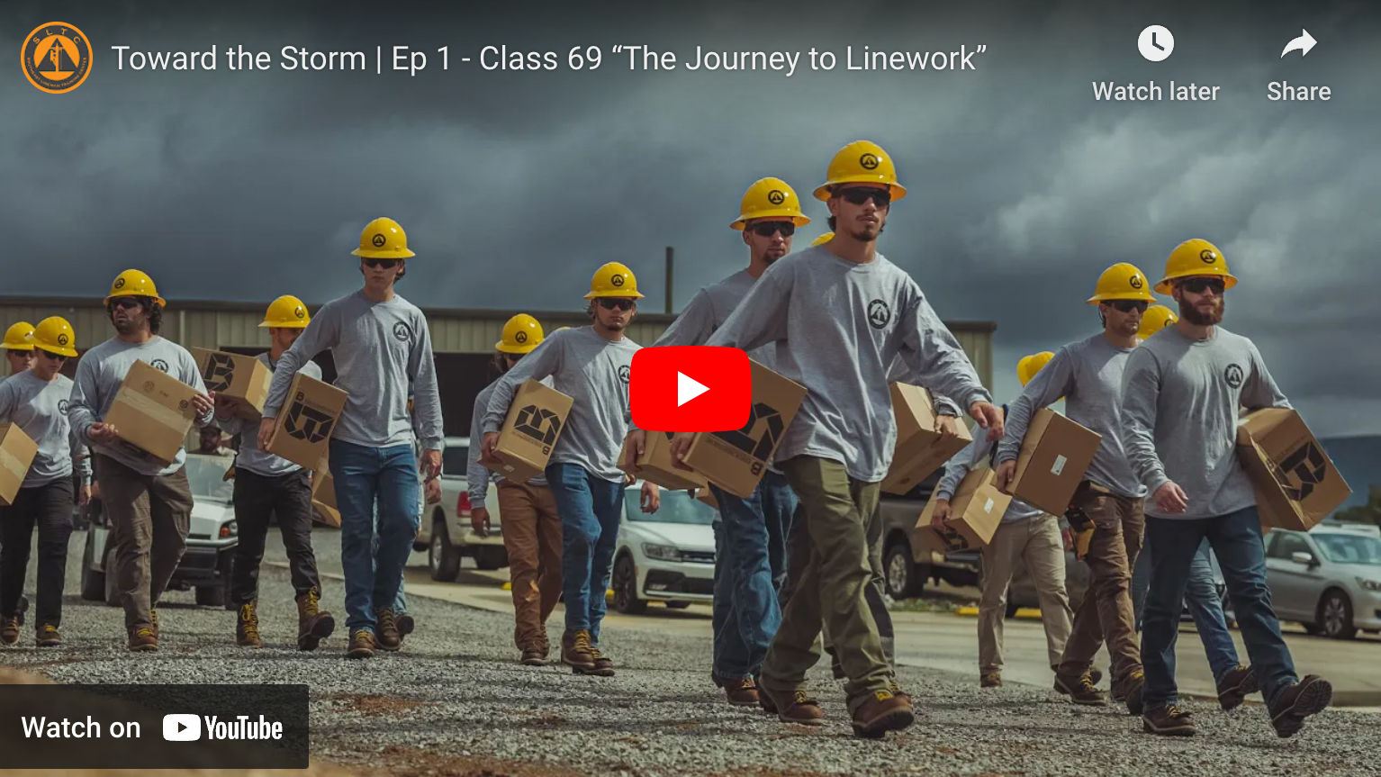 lineman students walking toward the storm